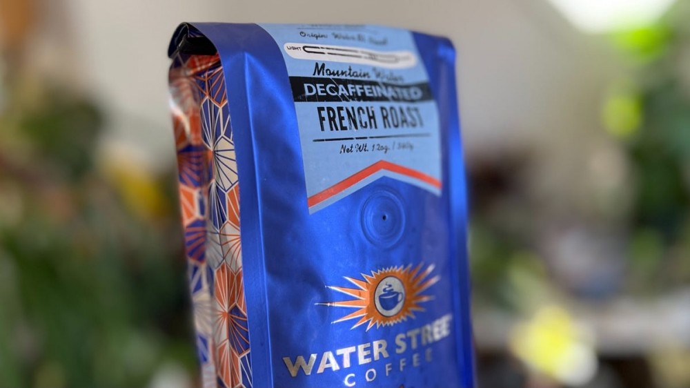 A bag of coffee features a vent on the front.